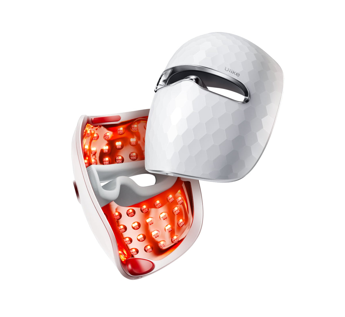 Woman wearing red light therapy face mask
