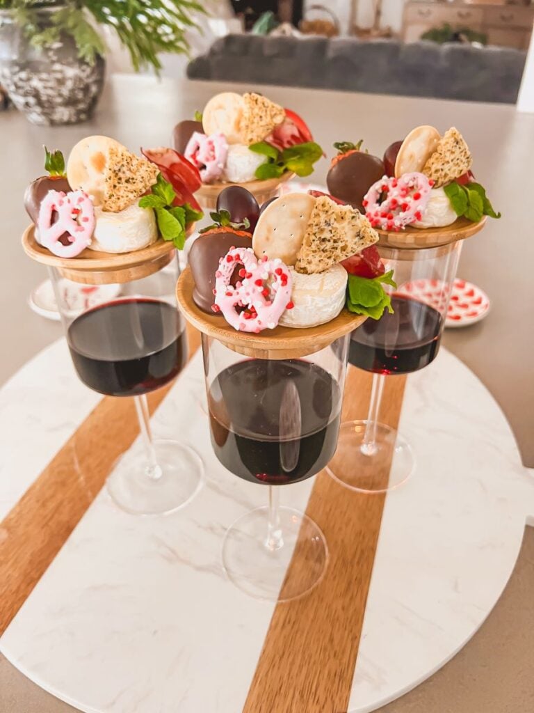 Wine glass charcuterie topper with appetizers